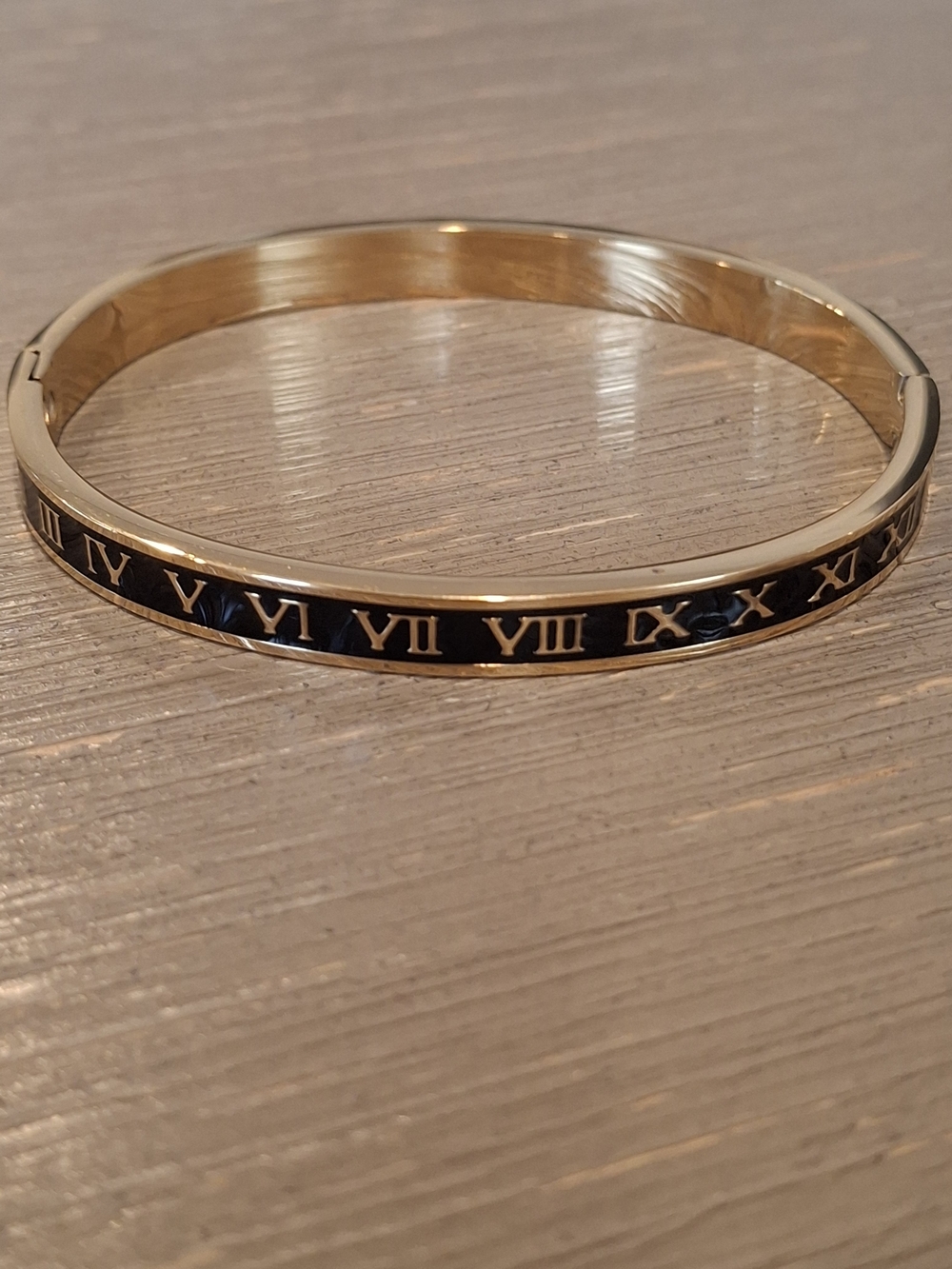Gold Tone Roman Numeral Bangle Bracelet in Black and Gold
